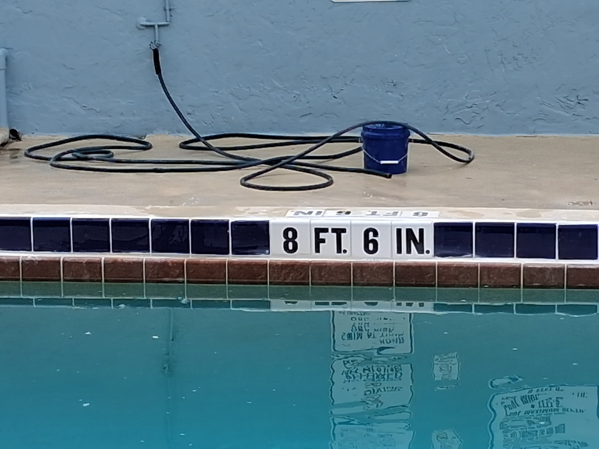 Pool tile depth marker cleaning